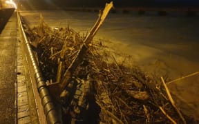 Debris banked up on Ashburton River Bridge