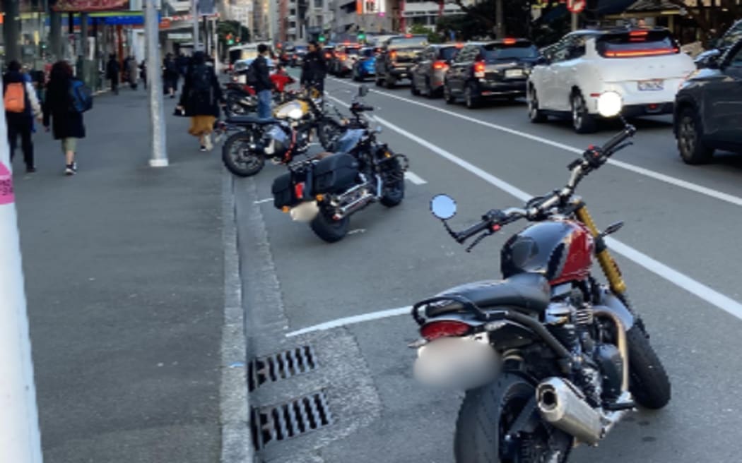 Motorcycles lined up in car parks protesting the new parking fees.