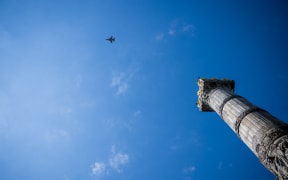 A picture of a F-16 fighter jet taken during the commemoration ceremony of the 80th anniversary of the end of the Second World War in Europe, at the Tomb of the Unknown Soldier, in Brussels, Thursday 08 May 2025. Exactly 80 years ago, on May 8, 1945 at 3:00 pm, the European population learned that the Second World War was coming to an end. The German army signed their capitulation the night before and the Allies were victorious. BELGA PHOTO JASPER JACOBS (Photo by JASPER JACOBS / BELGA MAG / Belga via AFP)