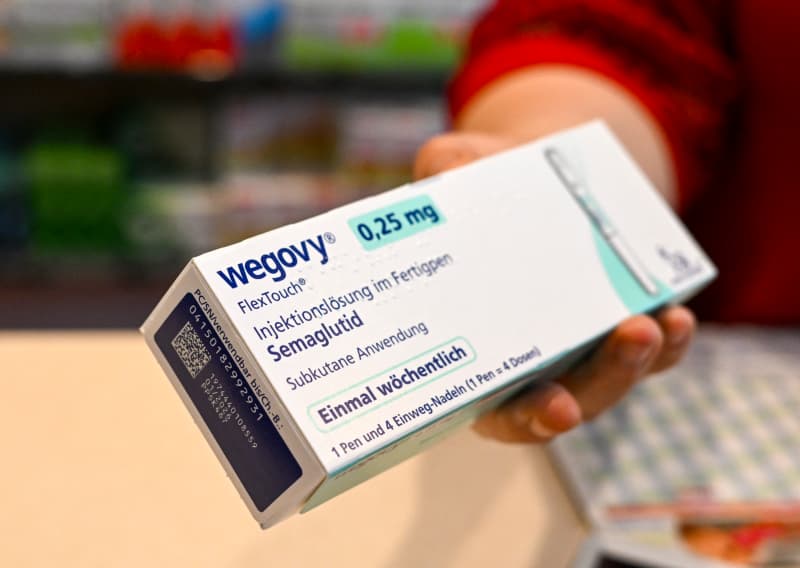 11 July 2024, Berlin: Wegovy" brand slimming syringes are sold in the Achat pharmacy in Mitte. Photo: Jens Kalaene/dpa (Photo by JENS KALAENE / DPA / dpa Picture-Alliance via AFP)