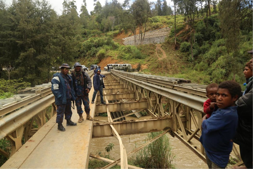 Members of PO16 at the Kera Bridge in Laiagam District.