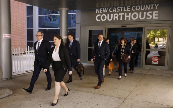 Members of the Dominion Voting Systems legal team leave the Leonard Williams Justice Center where Dominion was suing Fox News in Delaware Superior Court.