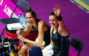 Joelle King and Amanda Landers-Murphy of New Zealand celebrate after winning against India in the Women's Doubles Gold Medal match.