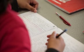 A student's book at Te Kura Kaupapa Maori O Takapu