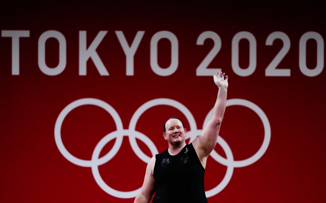 New Zealand's Laurel Hubbard waves during the women's +87kg weightlifting Group B competition at the Tokyo 2020 Olympic Games.