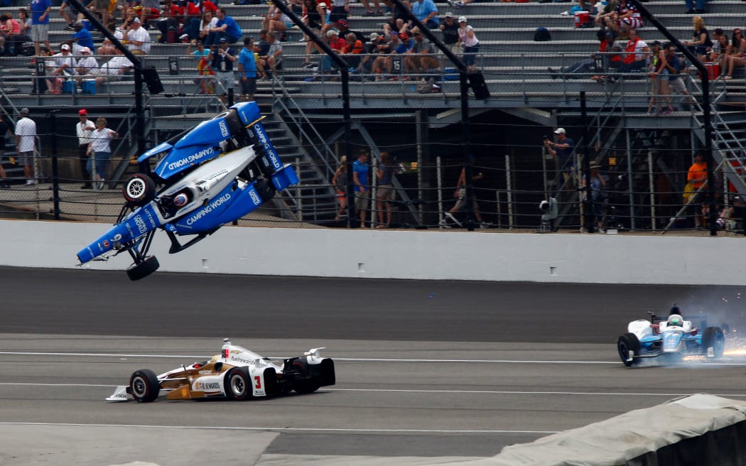Scott Dixon flies through the air during Indy 500.