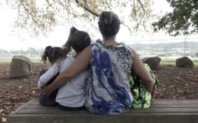 A grandmother with her children