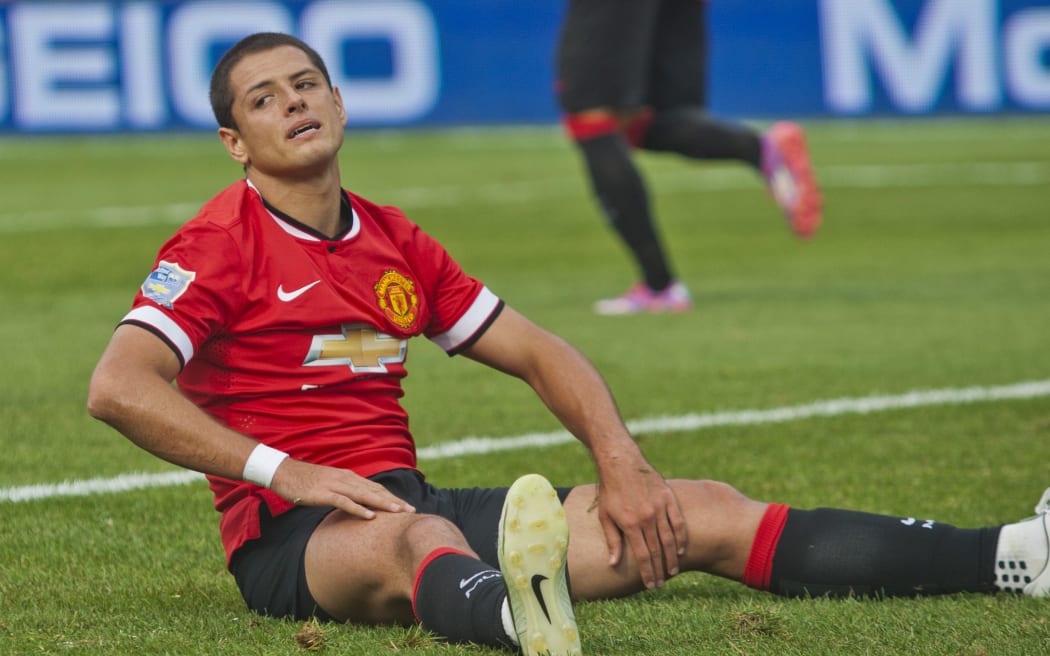 Manchester United forward Javier Hernandez reacts after missing a shot on goal. 2014.