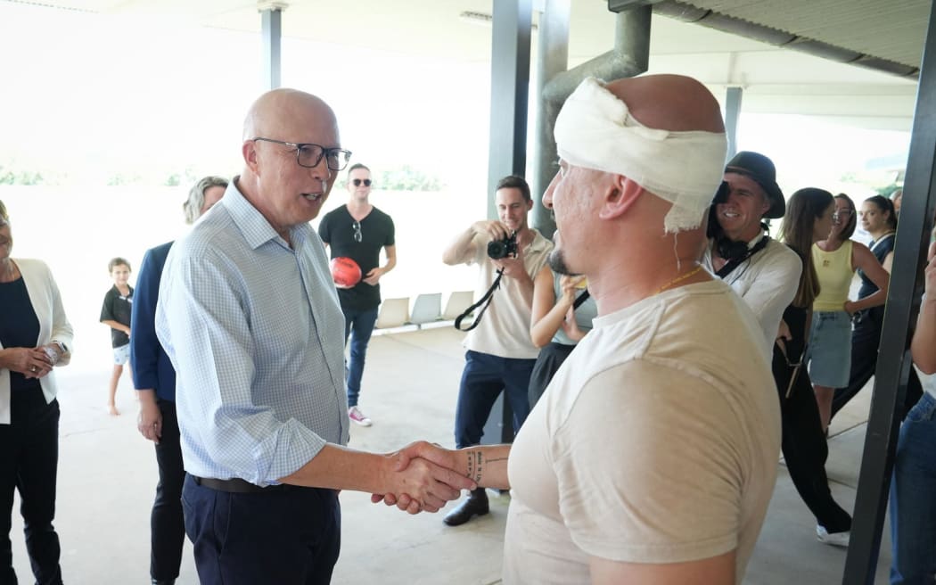 Peter Dutton with cameraman Ghaith Nadir.