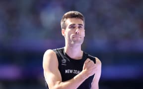 Hamish Kerr celebrates after competing in Group B of the Men's High Jump Qualifying at Stade de France during the 2024 Paris Olympics.