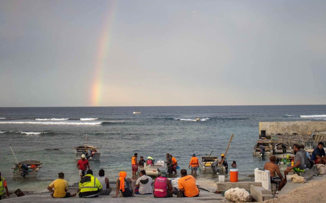 Waiting for boats to bring in their catches