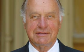 In this file photo taken on June 22, 2005, British actor Geoffrey Palmer celebrates becoming an Officer of the Most Excellent Order of the British Empire (OBE) at Buckingham Palace in central London.