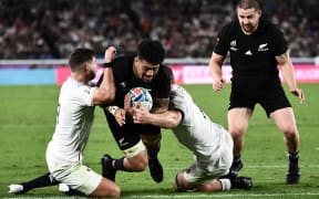 New Zealand's flanker Ardie Savea (2nd L) scores a try during the Japan 2019 Rugby World Cup semi-final match between England and New Zealand at the International Stadium Yokohama in Yokohama on October 26, 2019.