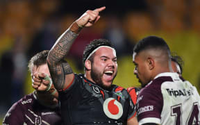 Jazz Tevaga celebrates his try.