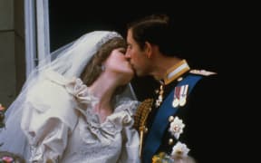 (Original Caption) Wedding of Prince Charles and Lady Diana Spencer. Shows the famous kiss on the balcony of Buckingham Palace, after ceremony.