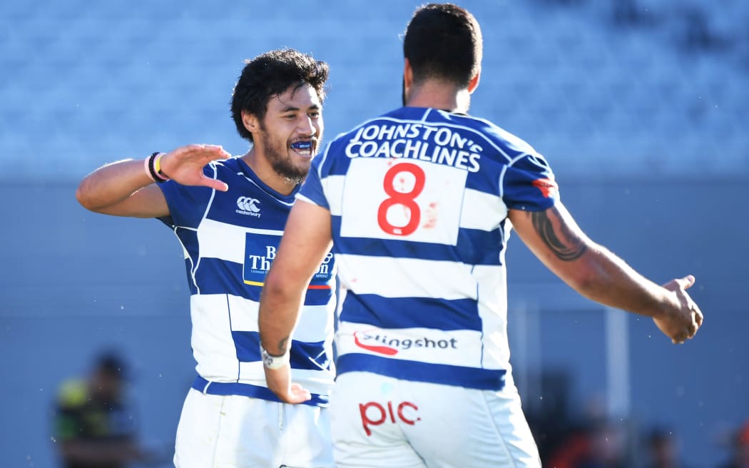 Akira Ioane celebrates a try with Melani Nanai in the semi-final against Wellington.