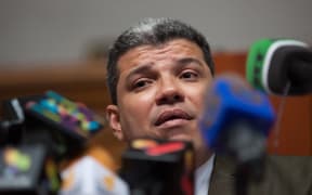 Luis Parra, who was elected President of the Chamber of Deputies by supporters of President Maduro and dissidents of the previous opposition, speaks at a press conference in Parliament.