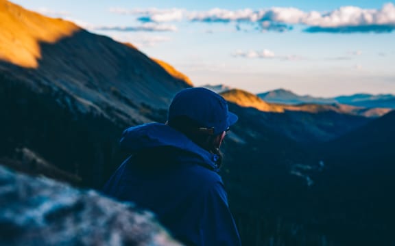 young man in the mountains