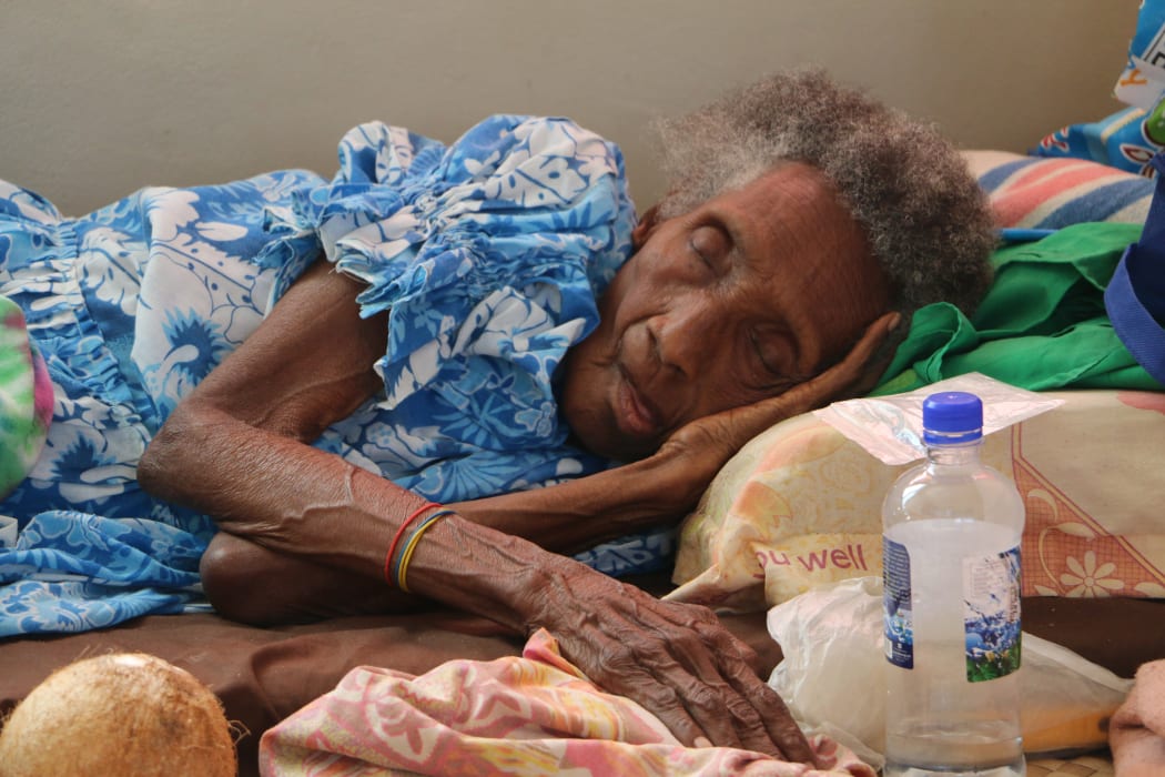 A woman in a special needs evacuation centre.