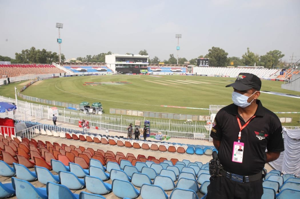 A Pakistani security forces personnel is seen in the cricket stadium following the cancellation of cricket series between Pakistan and New Zealand, in Rawalpindi, Pakistan, on September 17, 2021.