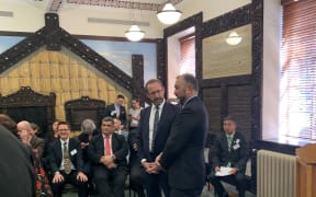 Andrew Little speaking with Moriori chief negotiator Maui Horomona.