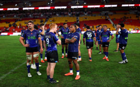 A dejected Blues side after their loss to the Reds.