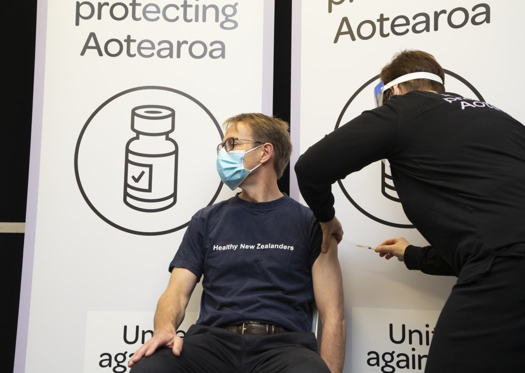 New Zealand Director-General of health Dr Ashley Bloomfield receiving his first dose of the Covid-19 vaccine.