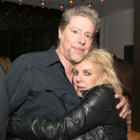 American musician Lucinda Williams and her partner Tom Overby in 2012
