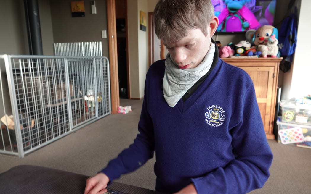 Ryan Cook has cri-du-chat syndrome, and requires full-time care.
