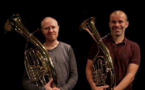Dillon Mayhew and Euan Harvey hold Wagner tubas