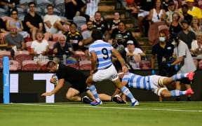 2020 Tri Nations Rugby. Los Pumas of Argentina v New Zealand All Blacks at McDonald Jones Stadium, Newcastle, NSW, Australia. Dane Coles of the All Blacks scores in the tackle of Argentinaâs Marcos Kremer. Photo: Stuart Walmsley / www.photosport.nz
