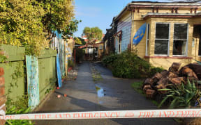 Fire damaged Bazil's Backpackers Hostel & Surf School in Russell Street, Westport.