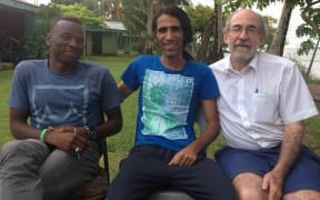 Ian Rintoul (right) on Manus Island with Abdul Aziz Muhamat and Behrouz Boochani.