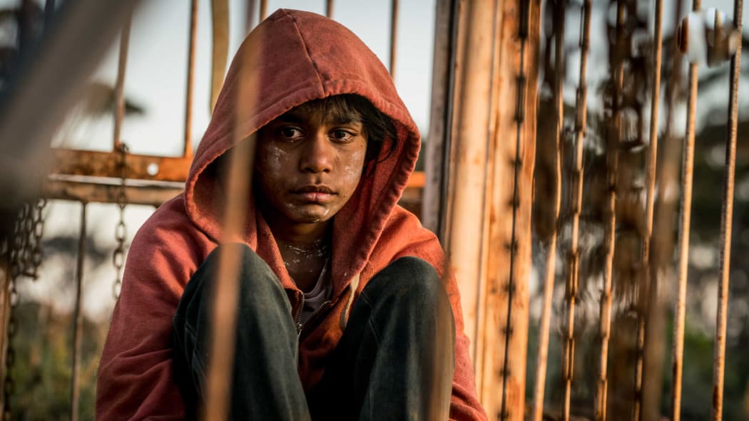Simone Landers plays Thoomi, on the run from the “virals” and the survivors in Cargo.