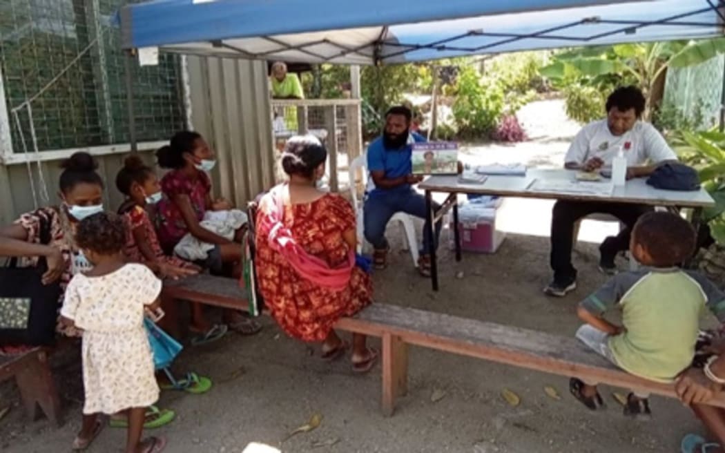 Badili TB clinic staff and community treatment supporters.