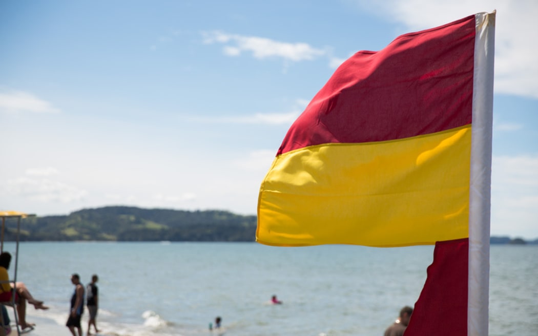 Surf lifesaving flags out at the beach.