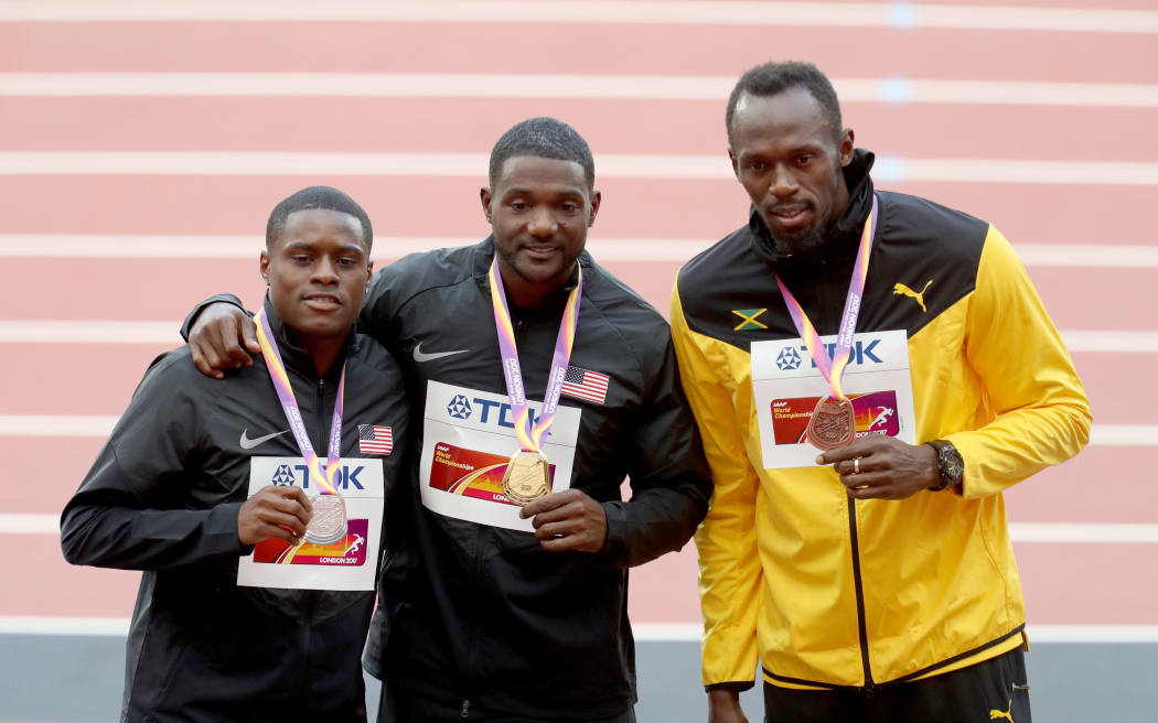 Mens 100m medalists Christian Coleman (USA, Silver) Justin Gatlin (USA, Gold) and Usain Bolt (Jamaica, Bronze) during the World Athletics Championships at the London Stadium, 2017.