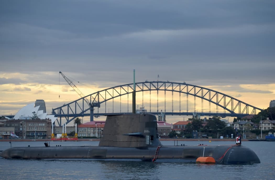 In this photo taken on October 12, 2016, a Royal Australian Navy diesel and electric-powered Collins Class submarine sits in Sydney Harbour. -