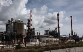 This photograph shows a general view of the Lavera oil refinery in Martigues, southern France on March 11, 2026. The 32 member countries of the International Energy Agency (IEA) decided on March 11, 2026 to unlock 400 million barrels of oil from their reserves -- the biggest such release ever -- to ease the impact of the Middle East war.