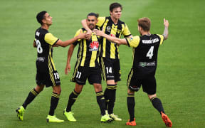 Phoenix striker David Williams celebrates his goal against Melbourne City.