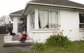 Dayna Clark and her family were forced to move into a motel after a house fire, but now have a small rental home in New Brighton.