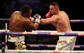 Joseph Parker lands a punch on Dereck Chisora.