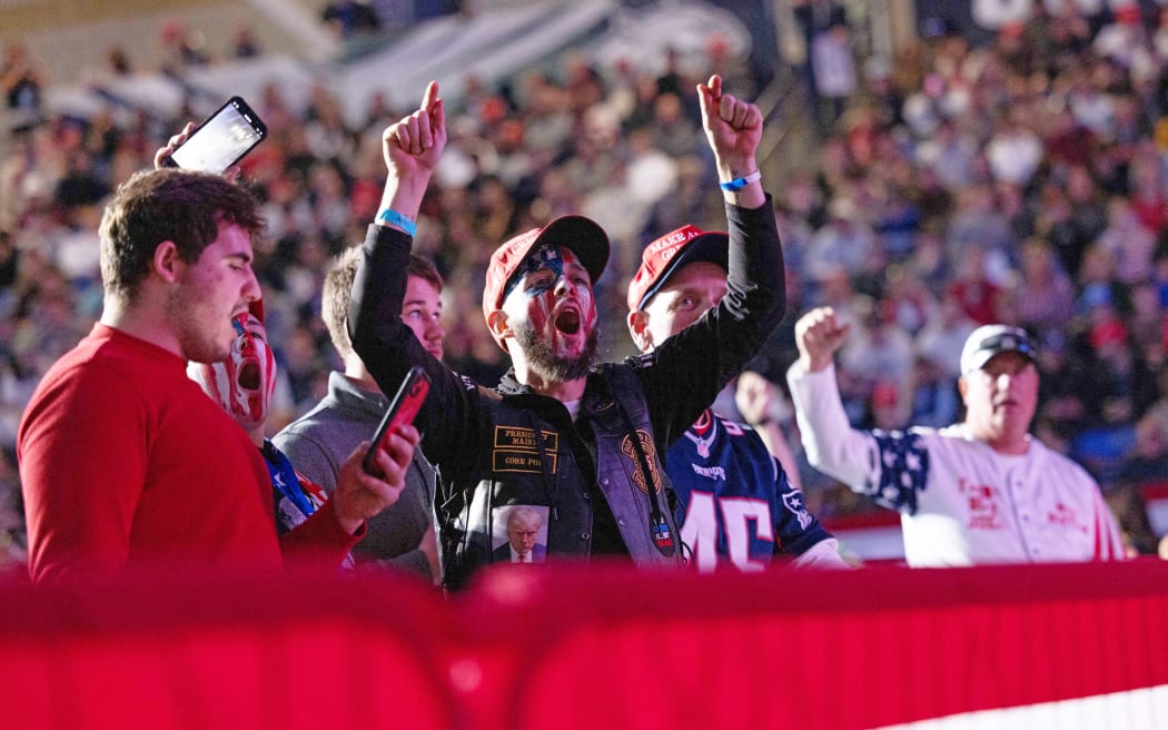 Supporters of Republican presidential candidate Donald Trump during a campaign event at the Whittemore Center Arena on 16 December, 2023 in Durham, New Hampshire.