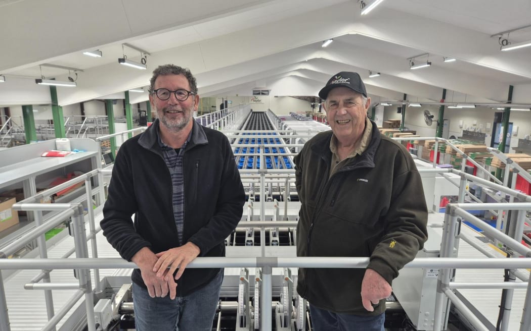 Plant and Food Research apple breeder Richard Volz and Taylor Corp owner Kelvin Taylor.