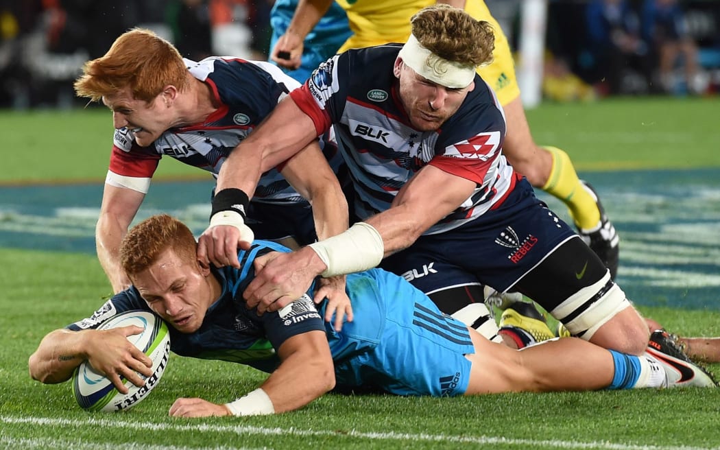 Ihaia West scores a try.