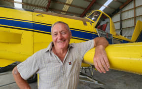 John Bargh with his Air Tractor AT-402B in the hangar on the family farm