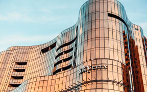 Australia: SkyCity Adelaide casino and hotel building viewed from the riverbank during sunset time on September 7, 2020.