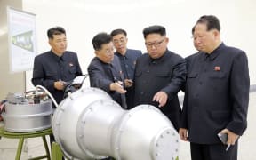 The news came hours after state media showed North Korean leader Kim Jong-un inspecting what it said was a hydrogen bomb.