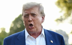 US President Donald Trump speaks to the press before boarding Marine One from the South Lawn of the White House in Washington, DC on 24 June, 2025, to attend the NATO's Heads of State and Government summit in The Hague.