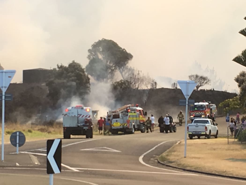 Homes have been evacuated as crews battle the blaze.
